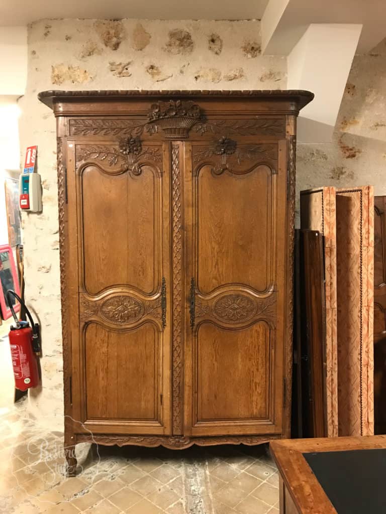 Antique Wardrobe in shop in Versailles