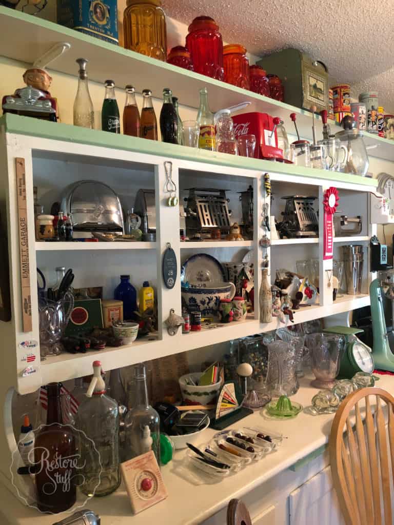 antiques & collectables kitchen cabinet filled