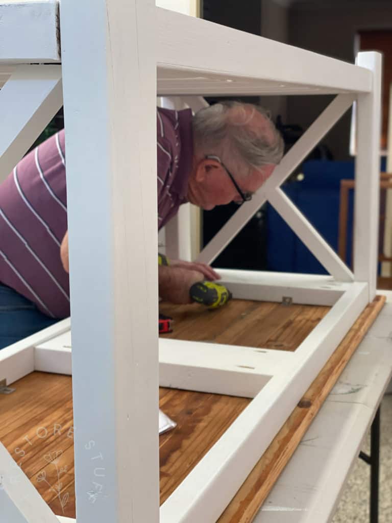 screwing top on farmhouse coffee table