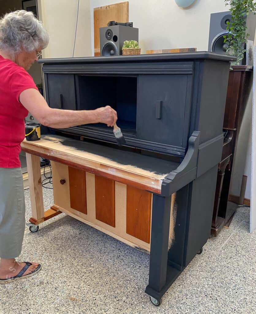 Mum painting piano