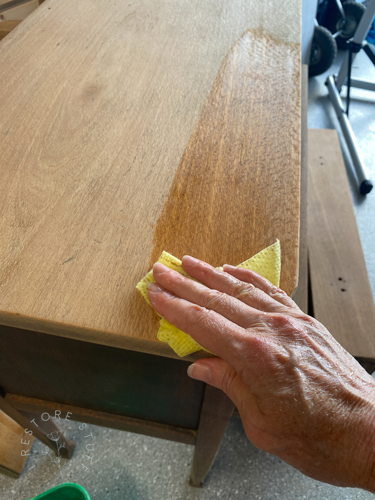 Sanded silky oak on top of dresser