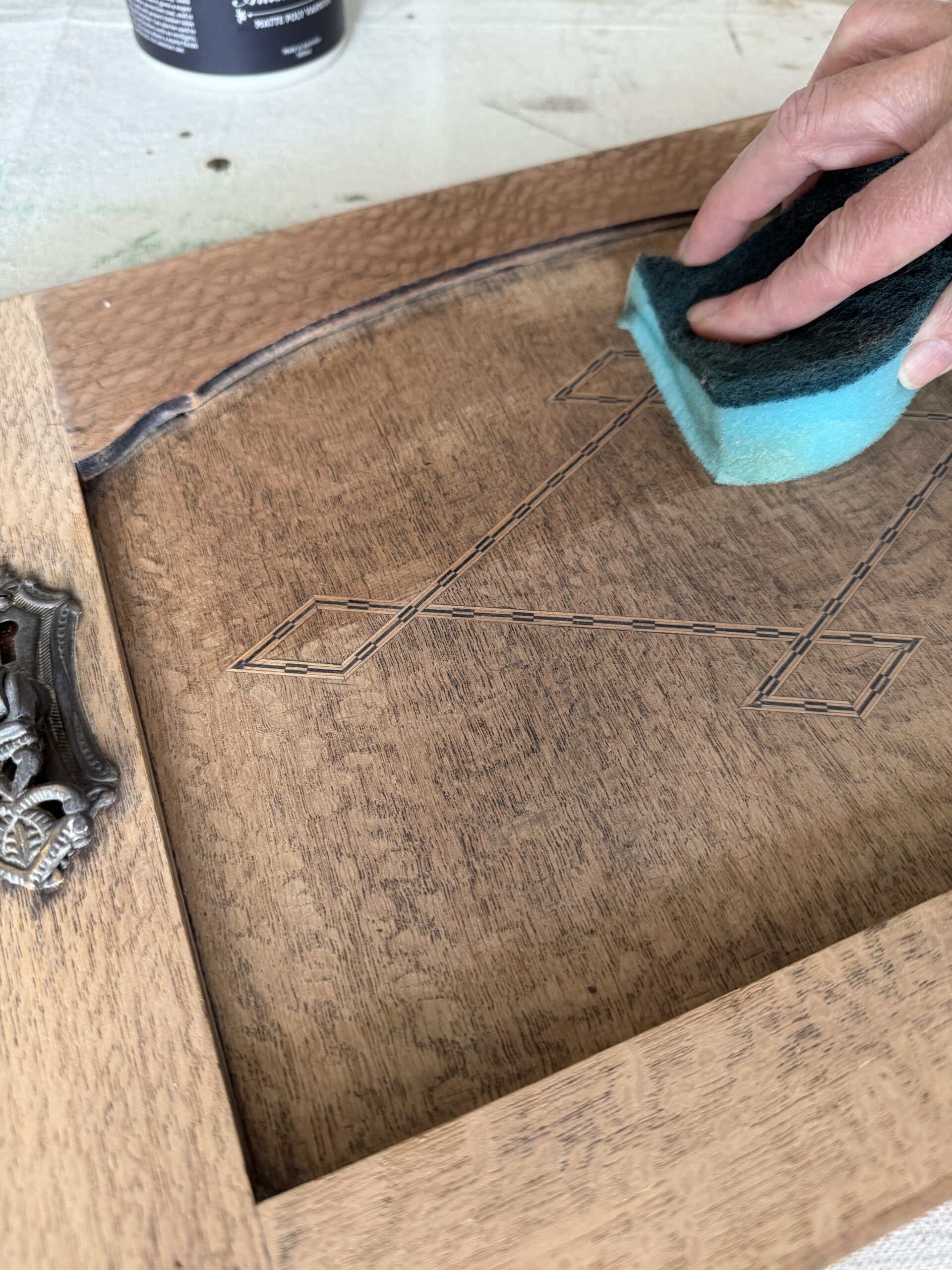 sealing the silky oak pot cupboard with Matte Poly Varnish.